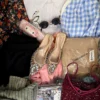 The photo shows a package with clothing in the category SN.