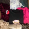 SN812 2 The photo shows a package with clothing in the category SN.