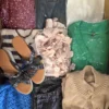 The photo shows a package with clothing in the category SN.