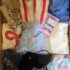 The photo shows a package with clothing in the category SN.