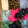 SN826 2 The photo shows a package with clothing in the category SN.