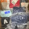 The photo shows a package with clothing in the category AP.