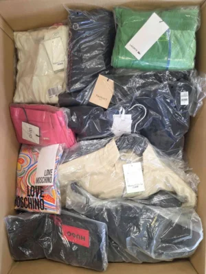 The photo shows a package with clothing in the category AP.