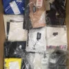 The photo shows a package with clothing in the category AP.