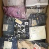 The photo shows a package with clothing in the category AP.