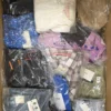 The photo shows a package with clothing in the category AP.
