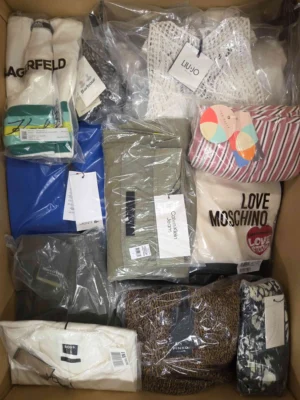 The photo shows a package with clothing in the category AP.