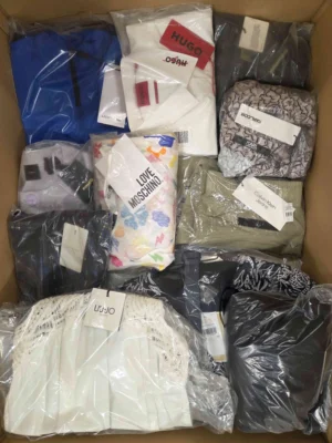 The photo shows a package with clothing in the category AP.