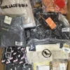 The photo shows a package with clothing in the category AP.