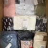 The photo shows a package with clothing in the category AP.