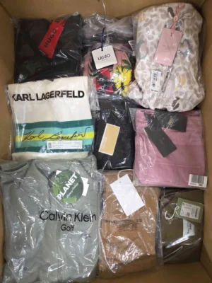 The photo shows a package with clothing in the category AP.