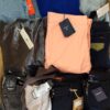 The photo shows a package with clothing in the category T.