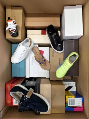 The photo shows a package with footwear in the category AS.