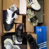 The photo shows a package with footwear in the category AS.