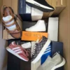 The photo shows a package with footwear in the category AS.