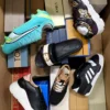 The photo shows a package with footwear in the category AS.