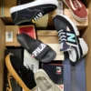 The photo shows a package with footwear in the category AS.
