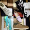 The photo shows a package with footwear in the category AS.