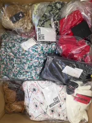 The photo shows a package with clothing in the category A.