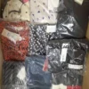 AD148 1 The photo shows a package with clothing in the category A.