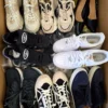 The photo shows a package with footwear in the category CSU.