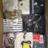 The photo shows a package with clothing in the category B.