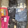 The photo shows a package with clothing in the category B.