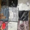 The photo shows a package with clothing in the category B.