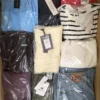 The photo shows a package with clothing in the category B.