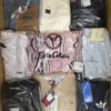 The photo shows a package with clothing in the category B.