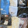 The photo shows a package with clothing in the category B.
