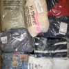 OT180 1 The photo shows a package with clothing in the category T.