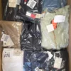 The photo shows a package with clothing in the category T.