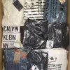 OT187 1 The photo shows a package with clothing in the category T.