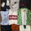 The photo shows a package with clothing in the category U.
