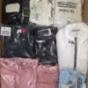 The photo shows a package with clothing in the category T.
