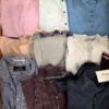 The photo shows a package with clothing in the category U.