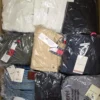 OT192 2 The photo shows a package with clothing in the category T.