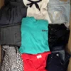 The photo shows a package with clothing in the category U.