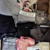 The photo shows a package with clothing in the category U.