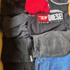 The photo shows a package with clothing in the category U.