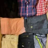 The photo shows a package with clothing in the category U.