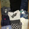 The photo shows a package with clothing in the category U.