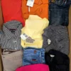 The photo shows a package with clothing in the category U.
