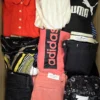 The photo shows a package with clothing in the category U.