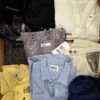 The photo shows a package with clothing in the category U.