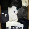 The photo shows a package with clothing in the category U.