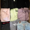 The photo shows a package with clothing in the category U.