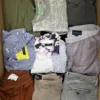The photo shows a package with clothing in the category U.