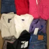 The photo shows a package with clothing in the category U.